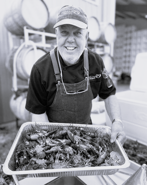 Chef Boil b&w Chef holding a pan of crawfish